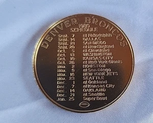 1980 Denver Broncos Spielplan, eine Bronco Buck Münze - Bild 1 von 2