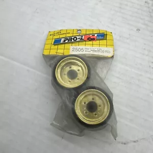 VINTAGE Proline 2505 REAR 1-1/2 3 PC WHEEL GOLD 100-RG RC10 KYOSHO TAMIYA B28 - Picture 1 of 1