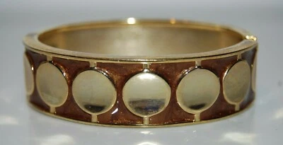 ELEGANTE BRAZALETE CON BISAGRAS DE METAL TONO DORADO ESMALTE MARRÓN DE ALTA COSTURA Foto 1 de 4