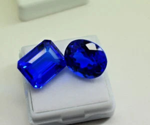 Coppia di pietre preziose zaffiro blu naturale 25 ct taglio ovale e smeraldo zaffiro blu sfuso - Foto 1 di 9