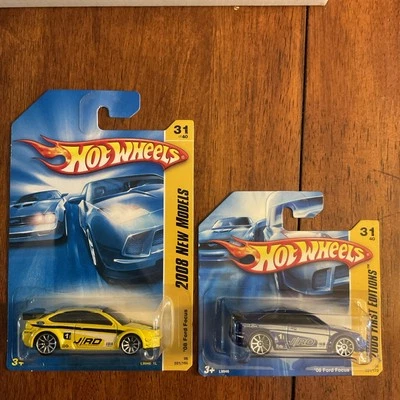 Hot Wheels 2008 New Models ‘08 Ford Focus Yellow long card, Blue short card - Image 1 of 4
