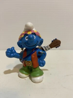 Guitarra Hippie Pitufo Pendiente Tatuaje Figura De Colección PVC Juguete Hitchin Jam Foto 1 de 4