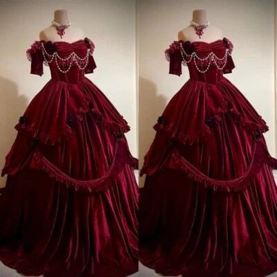 Vestidos de noche de terciopelo borgoña con cuentas de princesa con hombros descubiertos Foto 1 de 4