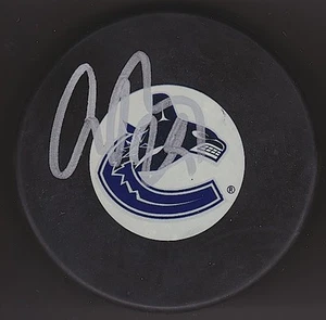 AARON ROME Signed VANCOUVER CANUCKS NHL Puck - 2011 CUP - Picture 1 of 1