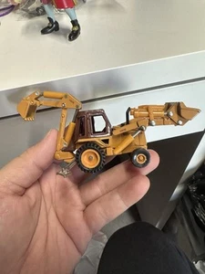 Case 580E Loader Backhoe 1/64 by Ertl  - Picture 1 of 2