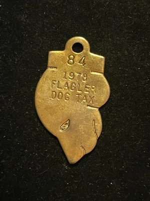 1978 Flagler Colorado 税务代币狗牌许可证 #84 人物形象 — 第 1/2 张图片
