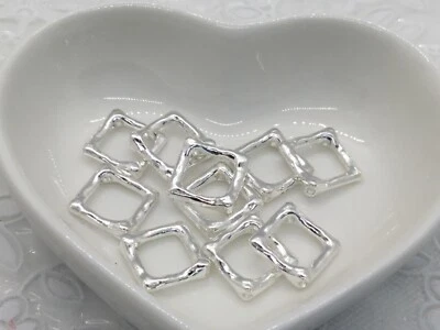 10 silver toned square metal bead frames for 6mm & 8mm beads, 10mm square frame - Image 1 of 2