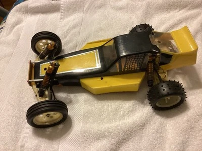 RC10 Team Associated Electric Racing RC  Off Road Buggy Gold Pan Vintage  - Image 1 of 4