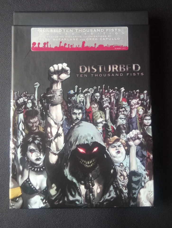 Disturbed – Ten Thousand Fists (Hardcover Book) - Bild 1 von 4