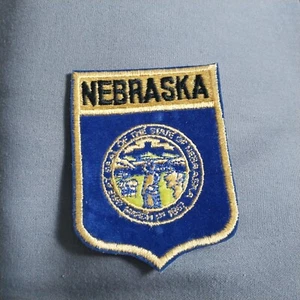 Nebraska NE State stemma 4" souvenir velluto blu oro ferro su toppa - Foto 1 di 2