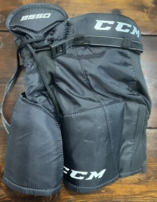 Pantalones de jugador de hockey sobre hielo CCM TACKS 9550 talla mediana juvenil Foto 1 de 3