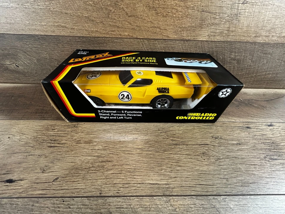 Vintage LaTrax Alpha RCX Yellow #24Remote Controlled Car CP-011 SEE DESCRIPTION - Image 1 of 4