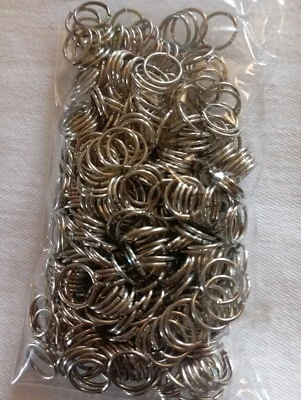 Minuterie Per Bigiotteria anellini color argento 8 mm Cod. 085/011 - Immagine 1 di 2