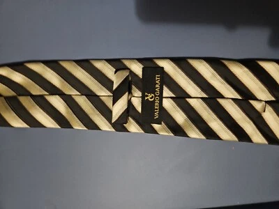 Corbata Hombre VALERIO GARATI 100% POLIÉSTER. Negro, Rojo, Tostado.58" L X 3" W Foto 1 de 4