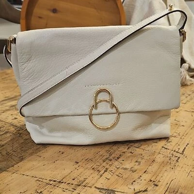 VINCE CAMUTO Plum White Pebbled Leather Shoulder Bag NWOT - Image 1 of 4