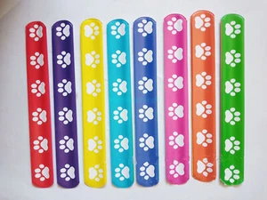 12x Animal Footprints Snap Bracelets Kids Party Bag Favour Stocking Filler Loot - Picture 1 of 1
