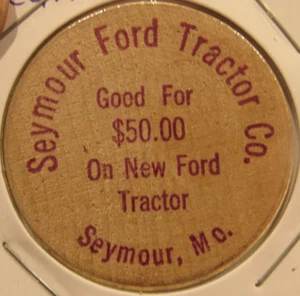 De colección Ford Tractor Co. Seymour, MO madera níquel - ficha púrpura Missouri - Imagen 1 de 2