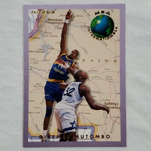 1993-94 Fleer NBA Internationals Dikembe Mutombo #7 Denver Nuggets - Bild 1 von 4