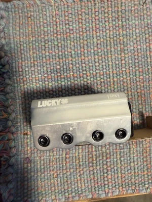 Lucky Scooter SCS Abrazadera Aluminio Pulido Colección Raíces Profundas Foto 1 de 4