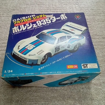 Daishin Martini Porsche 935 Turbo 1/24 mit Box ohne Antenne kostenloser... - Bild 1 von 4