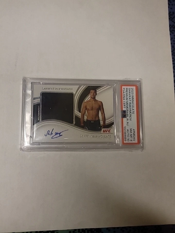 2023 UFC IMMACULATE 🔥SHAVKAT RAKHMONOV 🔥PRIMIUM MEMORABILIA AUTO PSA 8 - Image 1 of 1