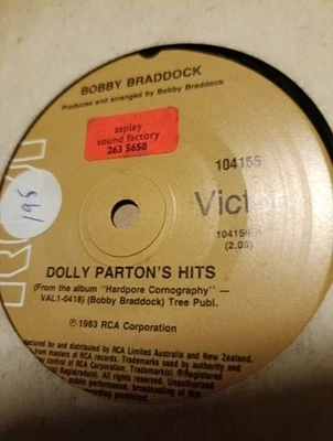 Bobby Braddock ‎– Dolly Parton's Hits.  7".   NM - Image 1 of 2