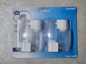 GREAT VALUE LED NIGHT LIGHTS DAYLIGHT PACKAGE OF 4 BRAND NEW - Picture 1 of 2