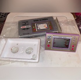 Nintendo Game & Watch: Snoopy Tennis handheld electronic game, model SP-30