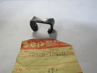 PAR DE ESPACIADORES REFLECTORES GENUINOS SUZUKI T350 J R 35995-18400 1971-72 Foto 1 de 2