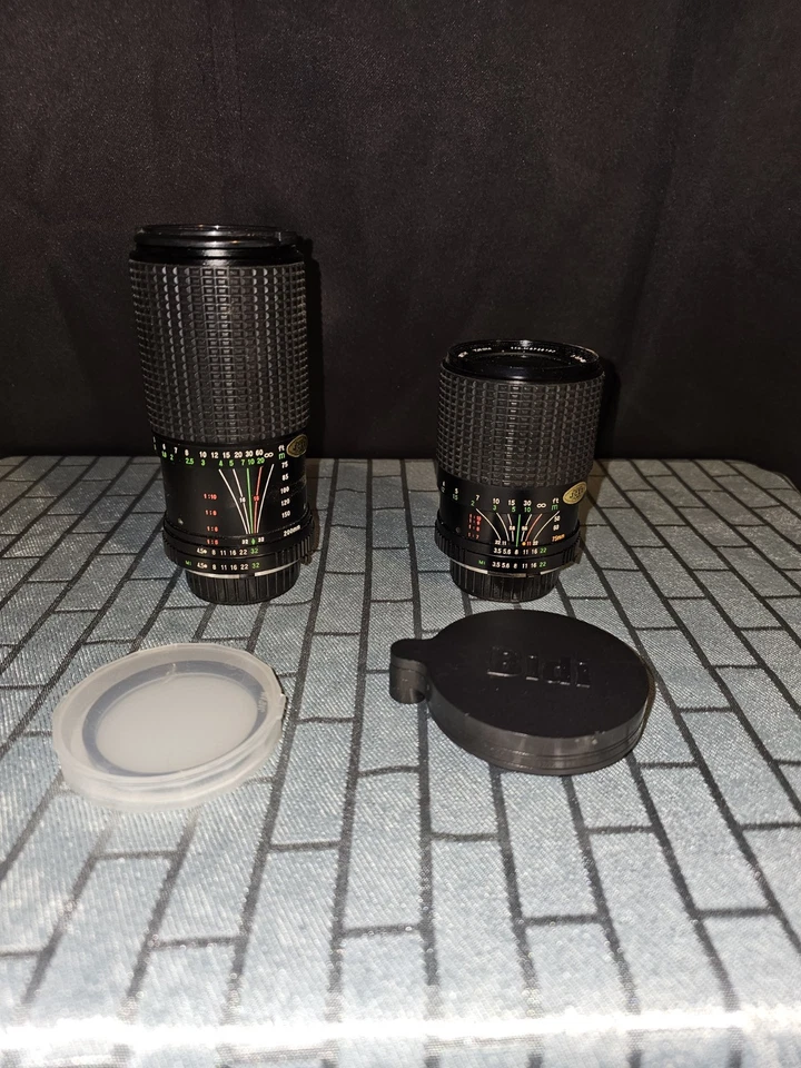 Toyota Five Star Optics 75-200mm And  35-75mm Camera Lenses Plus Filters - Image 1 of 4