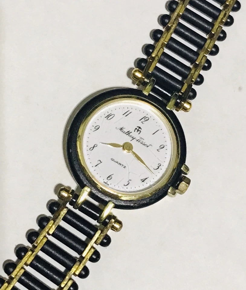 Reloj para mujer MATHEY TISSOT único dorado y negro de cuarzo hecho en Suiza 24 mm funciona Foto 1 de 4