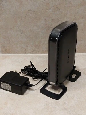 Módem por cable de alta velocidad Netgear CM400 DOCSIS 3.0 Comcast Xfinity Time Warner Foto 1 de 4