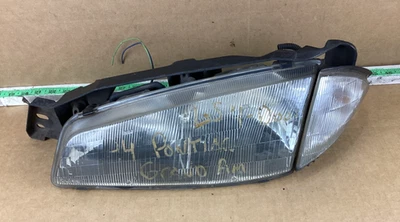 Faro delantero izquierdo del conductor Pontiac Grand Am 1992-1995 16514129 OEM Foto 1 de 4