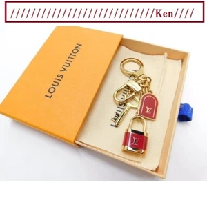 LOUIS VUITTON Bag charm AUTH Porto Cle Kaduna Gold Red - Picture 1 of 4
