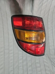 Used Left Tail Light Assembly fits: 2005 Pontiac Vibe quarter panel mounted Left - Picture 1 of 5