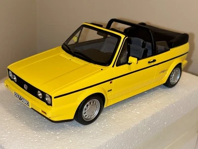 Volkswagen Golf Cabriolet 1988, amarillo pepita, otomóvil OT693, nuevo y NLA, 1/18 Foto 1 de 4