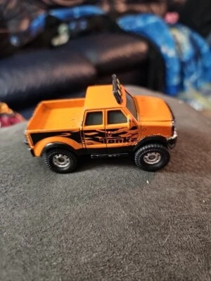 Tonka Diecast Hauler Orange Truck 2012 Hasbro 3in scale Areas Of Damage - Image 1 of 4