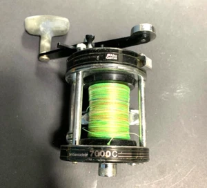 Abu Garcia Ambassador 7000C Compact Chrome Swedish 430g with Dual Stopper IAR - Bild 1 von 7