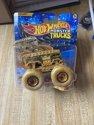 Hot Wheels Monster Trucks 5 alarmas doradas 1:64 2025 Foto 1 de 2