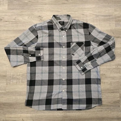 Camisa Oakley Para Hombre XXL Gris Negra Bolsillo con Botones Manga Larga Atlética Informal Foto 1 de 4