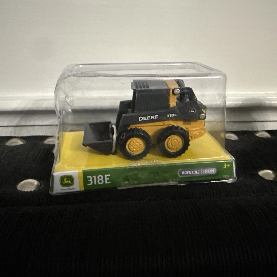 John Deere, Minicargadora, Modelo 318E, Juguete de Granja, COLECCIÓN ERTL/HIERRO, Sellado Foto 1 de 2