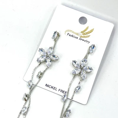 Elegantes pendientes largos de cristal llamativos deslumbrantes y ligeros para mujer Foto 1 de 4