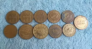 COLLECTION OF 11 VINTAGE ASSORTED ENTERTAINMENT BRASS TOKEN COINS - Picture 1 of 21