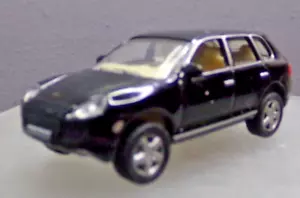 MALIBU ESCALA 1:87 HO NEGRO SUV PORCHE CAYENA - Imagen 1 de 7