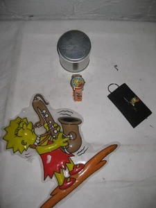 Simpsons 3 tlg. Geschenkeset Bart Armbanduhr Geldbeutel Simpsonsuhr Nr.12 - Bild 1 von 1