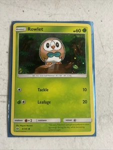 Pokemon SM Base Set Cosmo Holo Rowlet #9/149 Common - Bild 1 von 2