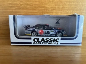 1:64 Craig Lowndes Classic Carlectables Ford BA Falcon 2005 Shanghai. Brand New - Picture 1 of 2