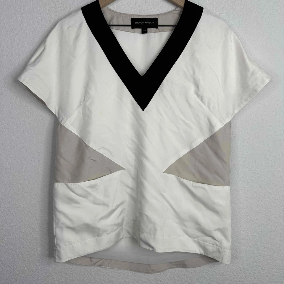 Camisa Hilton Hollis para mujer XS beige bloques de colores manga corta moderna blusa de carrera Foto 1 de 4