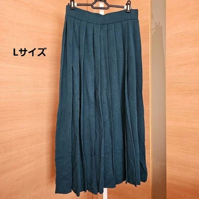 Falda plisada de lana merino verde talla L usada UNIQLO U Foto 1 de 4