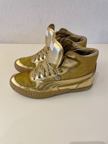 Sneakers Puma dorate taglia 43